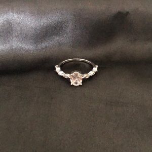 Described on purchase as Moissanite Pigeon Egg Ring
